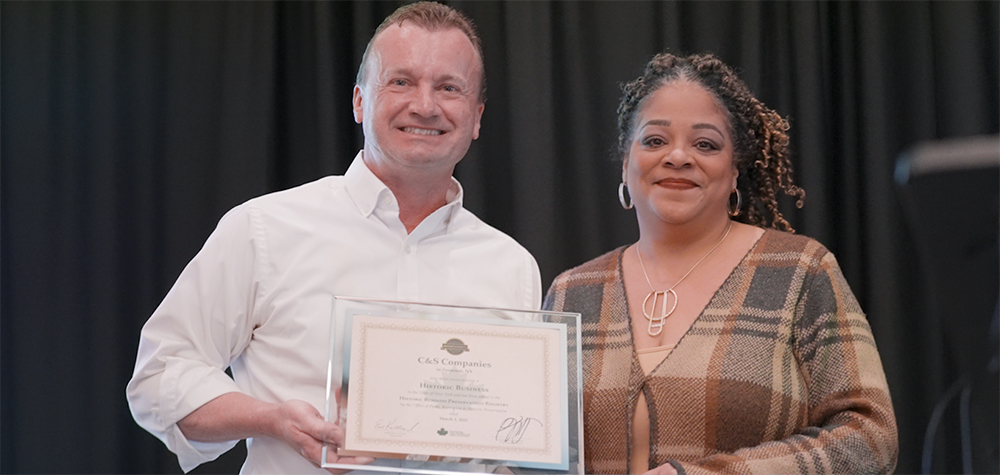 John Trimble and Pamela Hunter with award