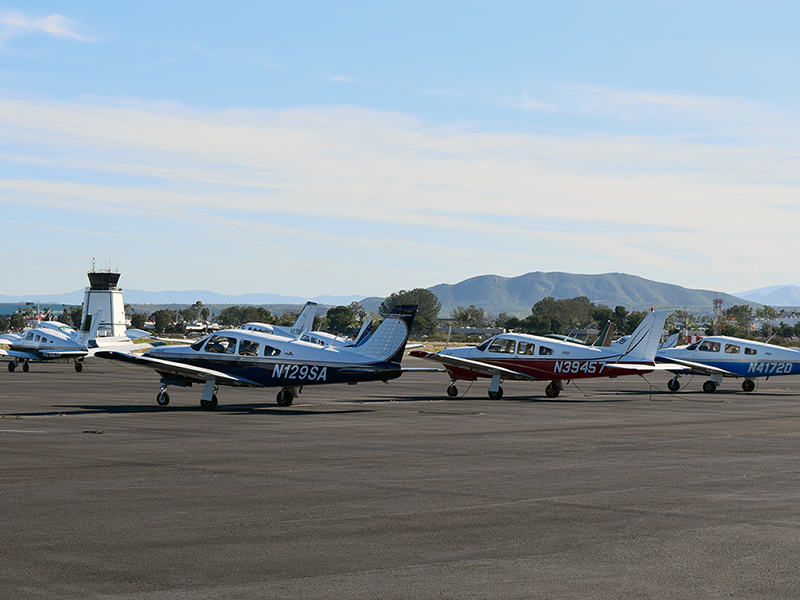 Small airplanes parked at Montgomery Gibbs Airport
