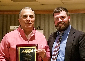 Frank Mento accepting the APWA Award