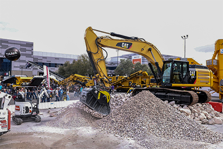 Construction industry equipment being demonstrated