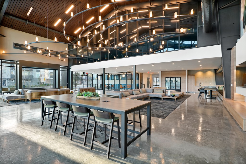 Interior overhead lighting fixtures and seating in the lobby of the wellness center