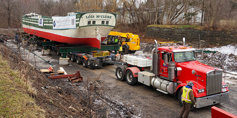 Lois McClure being positioned onto final blocks 
